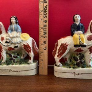 Pair Staffordshire Prince and Princess Riding Dog